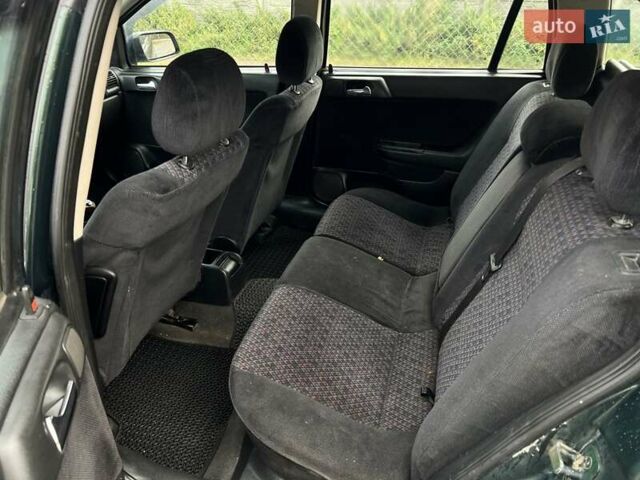 Зеленый Опель Астра, объемом двигателя 1.6 л и пробегом 250 тыс. км за 2550 $, фото 12 на Automoto.ua