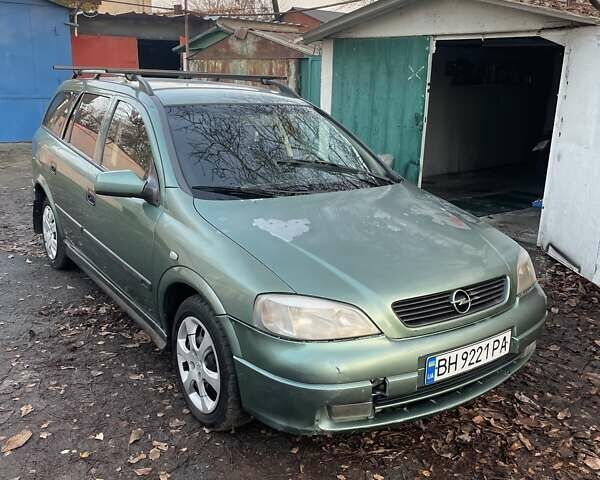 Зеленый Опель Астра, объемом двигателя 1.6 л и пробегом 227 тыс. км за 2100 $, фото 3 на Automoto.ua