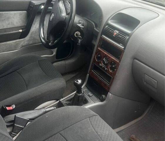 Зеленый Опель Астра, объемом двигателя 1.8 л и пробегом 245 тыс. км за 1200 $, фото 2 на Automoto.ua