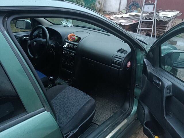 Зеленый Опель Астра, объемом двигателя 1.7 л и пробегом 420 тыс. км за 2800 $, фото 5 на Automoto.ua