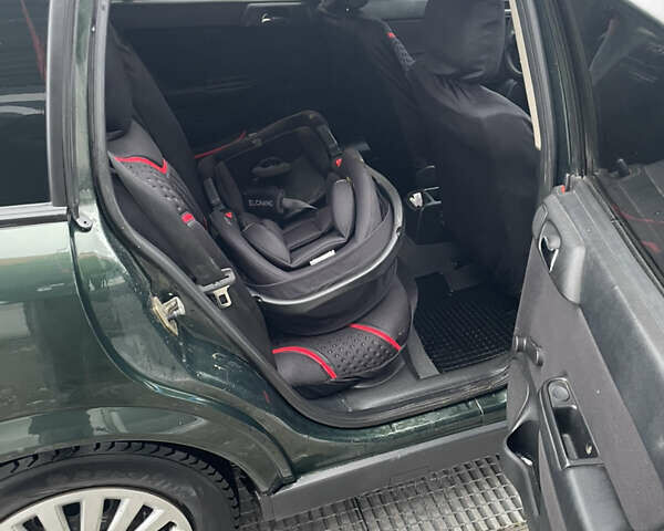 Зелений Опель Астра, об'ємом двигуна 1.69 л та пробігом 366 тис. км за 2300 $, фото 5 на Automoto.ua