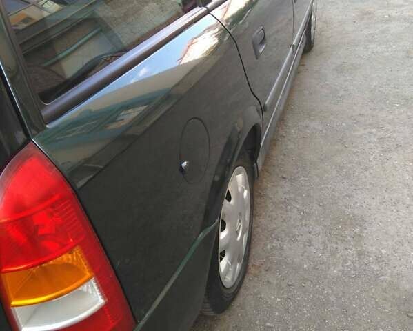 Зелений Опель Астра, об'ємом двигуна 1.6 л та пробігом 176 тис. км за 2800 $, фото 7 на Automoto.ua