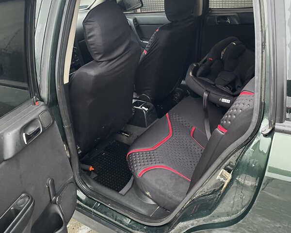 Зелений Опель Астра, об'ємом двигуна 1.69 л та пробігом 366 тис. км за 2300 $, фото 2 на Automoto.ua