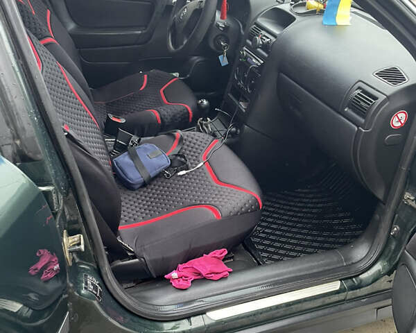 Зелений Опель Астра, об'ємом двигуна 1.69 л та пробігом 366 тис. км за 2300 $, фото 4 на Automoto.ua