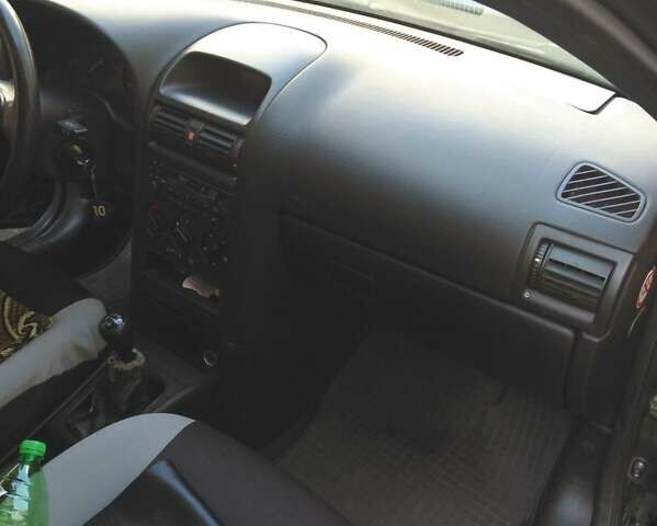 Зелений Опель Астра, об'ємом двигуна 1.6 л та пробігом 176 тис. км за 2800 $, фото 3 на Automoto.ua