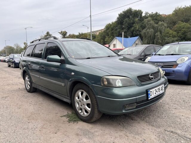 Зелений Опель Астра, об'ємом двигуна 1.6 л та пробігом 303 тис. км за 3301 $, фото 6 на Automoto.ua