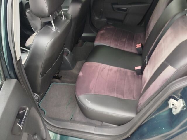 Зеленый Опель Астра, объемом двигателя 1.7 л и пробегом 321 тыс. км за 5000 $, фото 11 на Automoto.ua