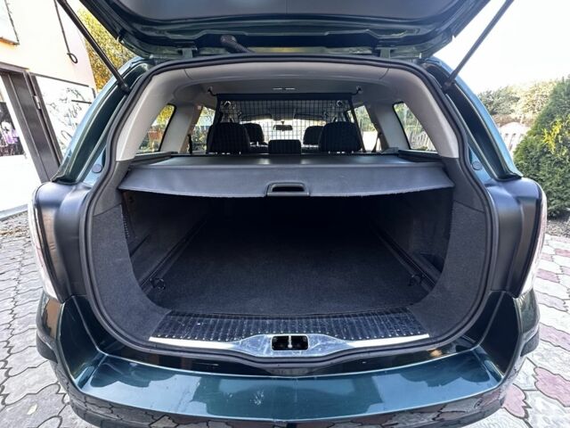 Зелений Опель Астра, об'ємом двигуна 1.6 л та пробігом 202 тис. км за 5300 $, фото 4 на Automoto.ua