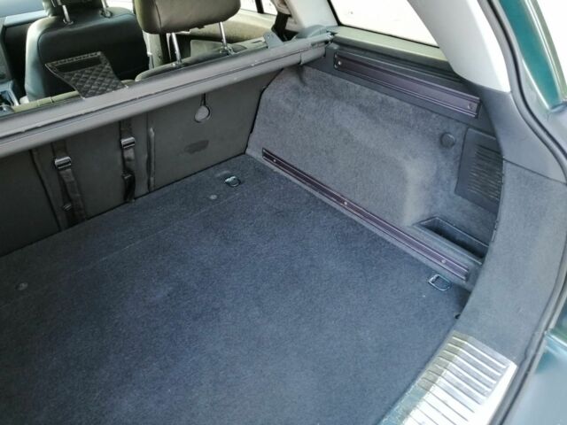 Зеленый Опель Астра, объемом двигателя 1.7 л и пробегом 321 тыс. км за 5000 $, фото 6 на Automoto.ua