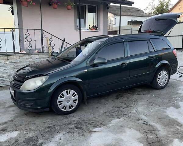 Зеленый Опель Астра, объемом двигателя 1.6 л и пробегом 308 тыс. км за 4400 $, фото 15 на Automoto.ua