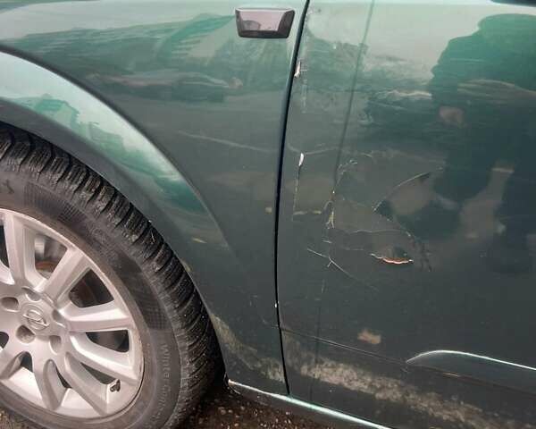 Зеленый Опель Астра, объемом двигателя 1.6 л и пробегом 280 тыс. км за 3850 $, фото 12 на Automoto.ua