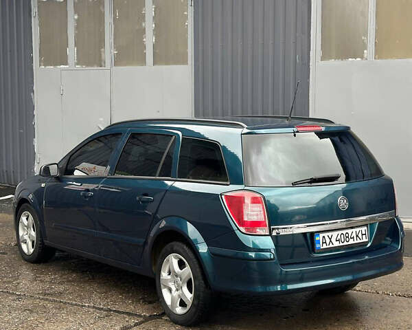 Зеленый Опель Астра, объемом двигателя 1.6 л и пробегом 210 тыс. км за 3999 $, фото 4 на Automoto.ua