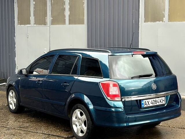 Зелений Опель Астра, об'ємом двигуна 1.6 л та пробігом 210 тис. км за 4699 $, фото 4 на Automoto.ua