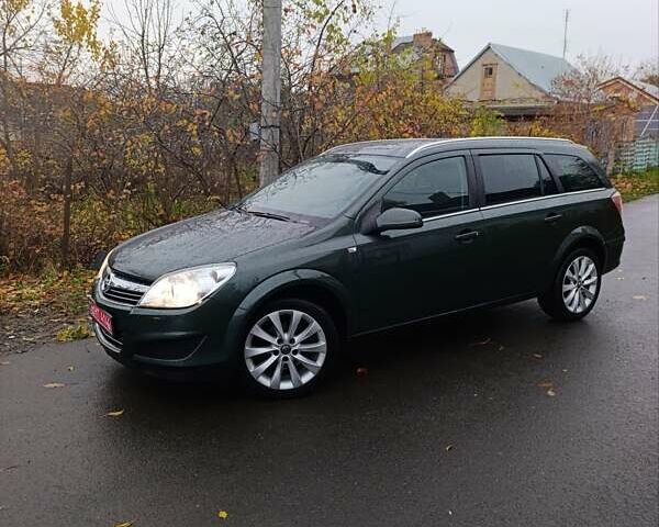 Зеленый Опель Астра, объемом двигателя 1.6 л и пробегом 208 тыс. км за 5900 $, фото 6 на Automoto.ua