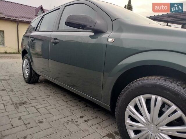 Зеленый Опель Астра, объемом двигателя 1.6 л и пробегом 206 тыс. км за 5450 $, фото 16 на Automoto.ua