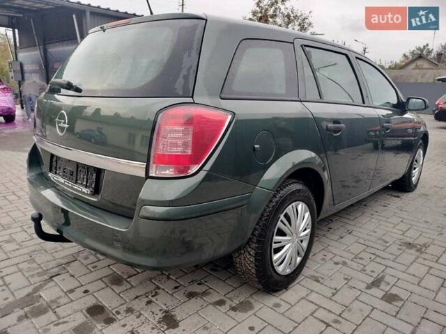Зеленый Опель Астра, объемом двигателя 1.6 л и пробегом 206 тыс. км за 5200 $, фото 6 на Automoto.ua
