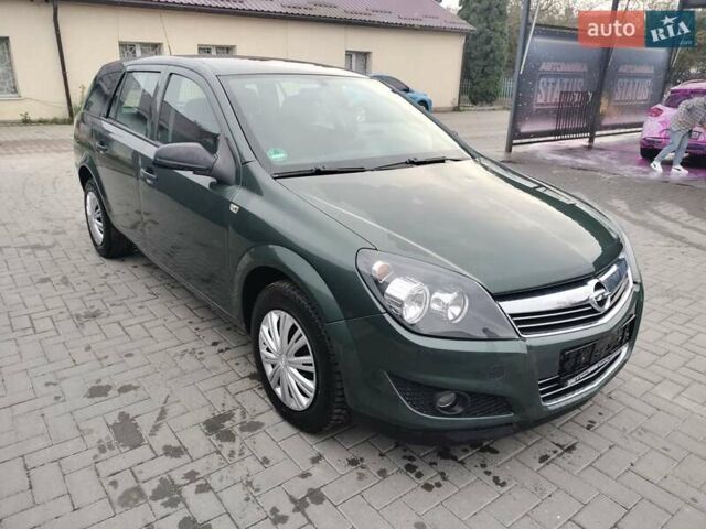 Зеленый Опель Астра, объемом двигателя 1.6 л и пробегом 206 тыс. км за 5450 $, фото 20 на Automoto.ua