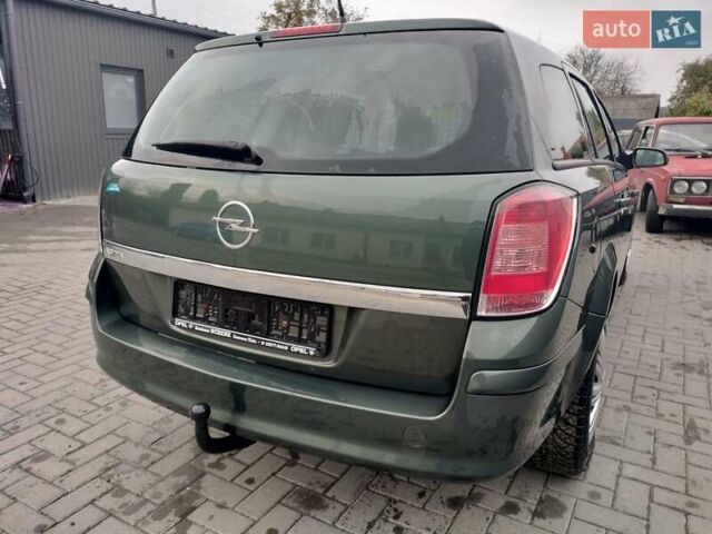 Зеленый Опель Астра, объемом двигателя 1.6 л и пробегом 206 тыс. км за 5450 $, фото 12 на Automoto.ua