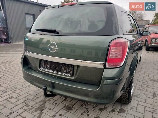 Зеленый Опель Астра, объемом двигателя 1.6 л и пробегом 206 тыс. км за 5450 $, фото 13 на Automoto.ua