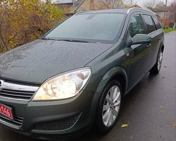 Зеленый Опель Астра, объемом двигателя 1.6 л и пробегом 208 тыс. км за 5900 $, фото 24 на Automoto.ua