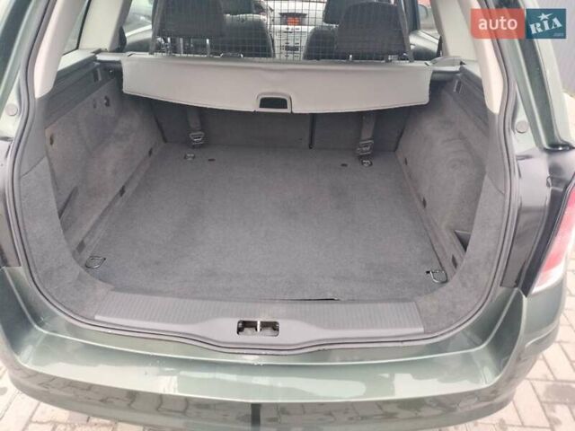 Зеленый Опель Астра, объемом двигателя 1.6 л и пробегом 206 тыс. км за 5450 $, фото 3 на Automoto.ua