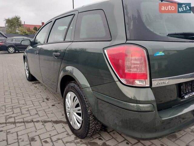 Зеленый Опель Астра, объемом двигателя 1.6 л и пробегом 206 тыс. км за 5450 $, фото 10 на Automoto.ua