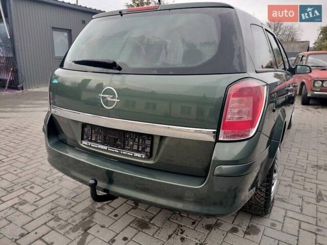 Зеленый Опель Астра, объемом двигателя 1.6 л и пробегом 206 тыс. км за 5200 $, фото 7 на Automoto.ua