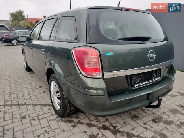 Зеленый Опель Астра, объемом двигателя 1.6 л и пробегом 206 тыс. км за 5450 $, фото 11 на Automoto.ua