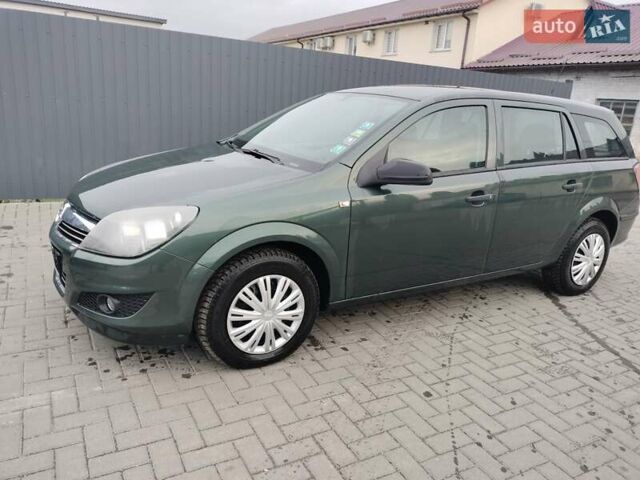 Зеленый Опель Астра, объемом двигателя 1.6 л и пробегом 206 тыс. км за 5450 $, фото 21 на Automoto.ua