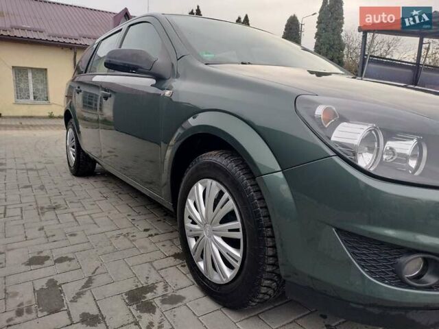 Зеленый Опель Астра, объемом двигателя 1.6 л и пробегом 206 тыс. км за 5450 $, фото 15 на Automoto.ua
