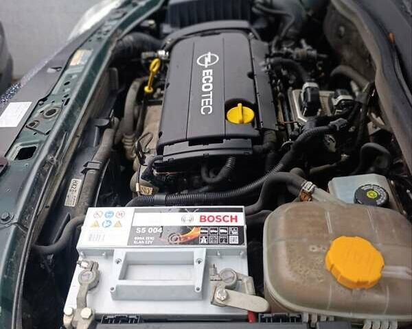 Зеленый Опель Астра, объемом двигателя 1.6 л и пробегом 208 тыс. км за 5900 $, фото 55 на Automoto.ua