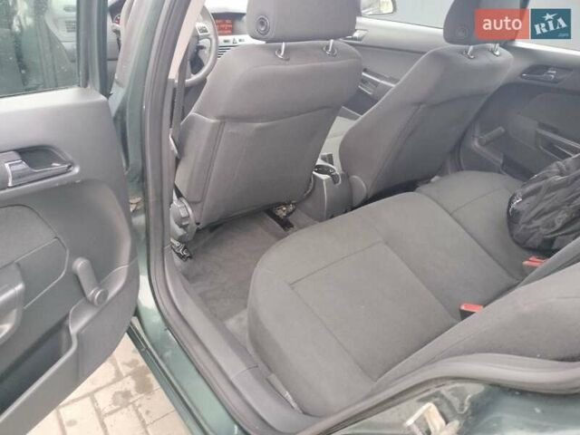 Зеленый Опель Астра, объемом двигателя 1.6 л и пробегом 206 тыс. км за 5450 $, фото 4 на Automoto.ua