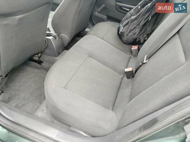 Зеленый Опель Астра, объемом двигателя 1.6 л и пробегом 206 тыс. км за 5200 $, фото 11 на Automoto.ua