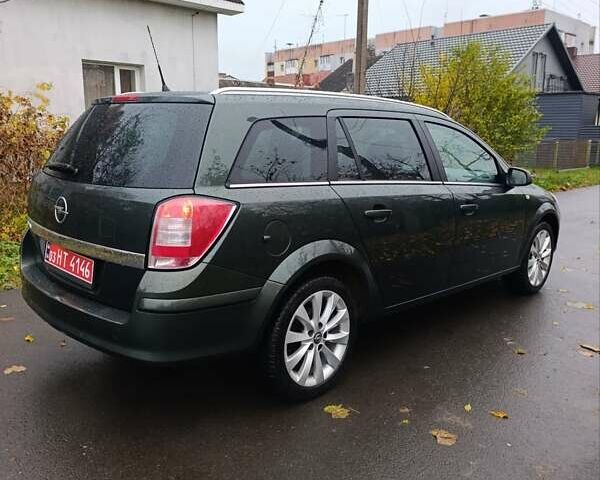 Зеленый Опель Астра, объемом двигателя 1.6 л и пробегом 208 тыс. км за 5900 $, фото 17 на Automoto.ua