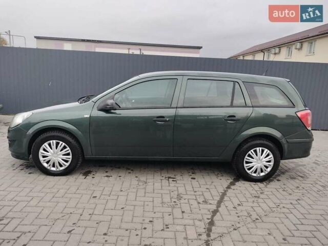 Зеленый Опель Астра, объемом двигателя 1.6 л и пробегом 206 тыс. км за 5450 $, фото 6 на Automoto.ua