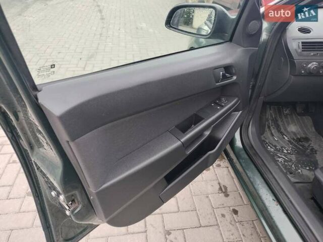 Зеленый Опель Астра, объемом двигателя 1.6 л и пробегом 206 тыс. км за 5200 $, фото 12 на Automoto.ua