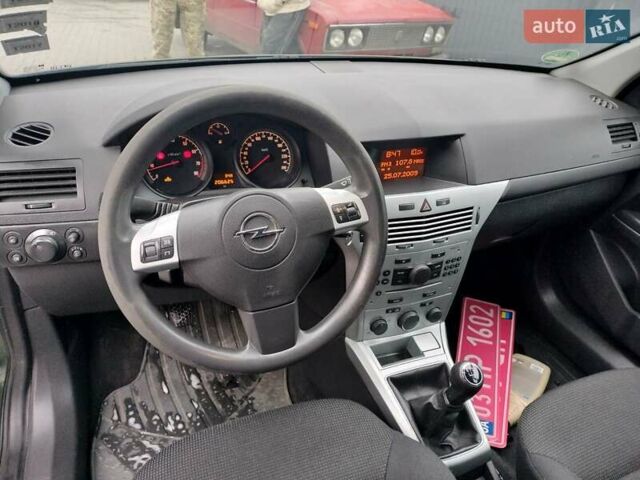 Зеленый Опель Астра, объемом двигателя 1.6 л и пробегом 206 тыс. км за 5450 $, фото 7 на Automoto.ua