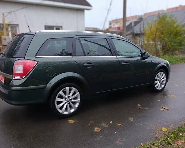 Зеленый Опель Астра, объемом двигателя 1.6 л и пробегом 208 тыс. км за 5900 $, фото 26 на Automoto.ua