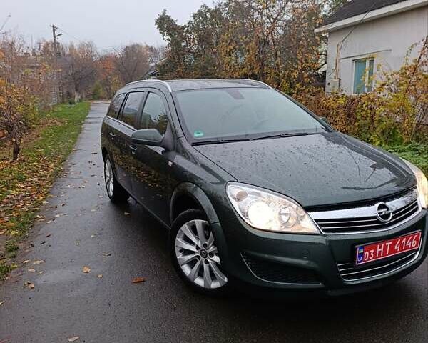 Зеленый Опель Астра, объемом двигателя 1.6 л и пробегом 208 тыс. км за 5900 $, фото 4 на Automoto.ua