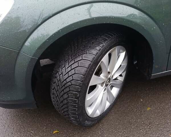 Зеленый Опель Астра, объемом двигателя 1.6 л и пробегом 208 тыс. км за 5900 $, фото 2 на Automoto.ua