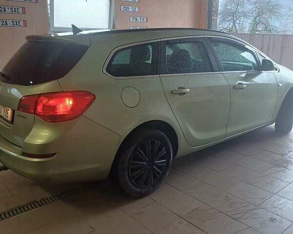 Зеленый Опель Астра, объемом двигателя 1.4 л и пробегом 193 тыс. км за 6999 $, фото 1 на Automoto.ua