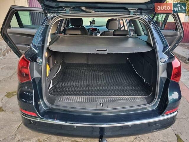 Зелений Опель Астра, об'ємом двигуна 1.6 л та пробігом 136 тис. км за 8300 $, фото 18 на Automoto.ua