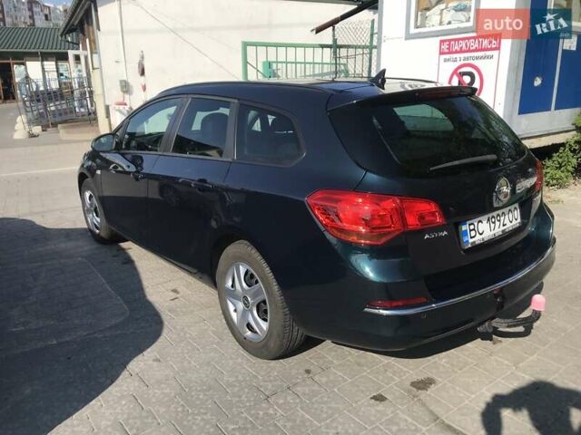 Зелений Опель Астра, об'ємом двигуна 1.6 л та пробігом 234 тис. км за 6000 $, фото 3 на Automoto.ua