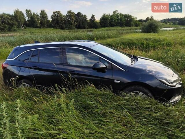 Зелений Опель Астра, об'ємом двигуна 1.6 л та пробігом 213 тис. км за 12950 $, фото 39 на Automoto.ua