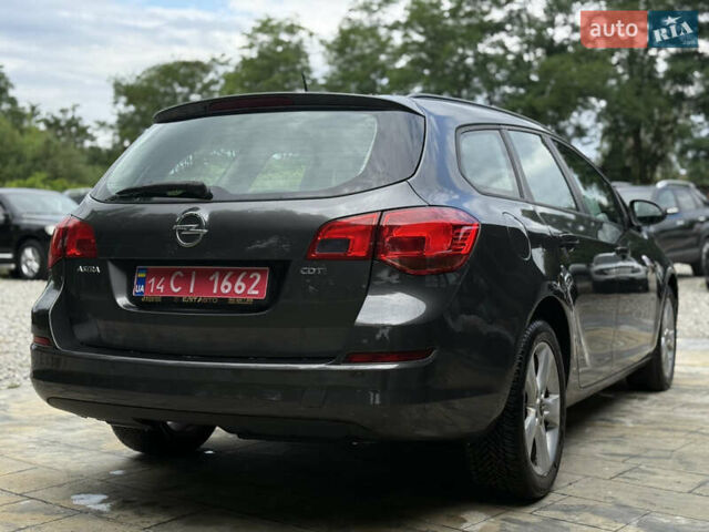Оранжевый Опель Астра, объемом двигателя 1.7 л и пробегом 171 тыс. км за 7700 $, фото 2 на Automoto.ua