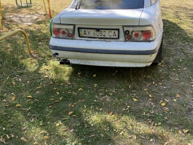 Белый Опель Калибра, объемом двигателя 2 л и пробегом 250 тыс. км за 1500 $, фото 1 на Automoto.ua