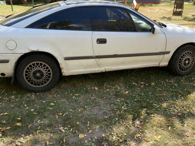 Белый Опель Калибра, объемом двигателя 2 л и пробегом 250 тыс. км за 1500 $, фото 6 на Automoto.ua