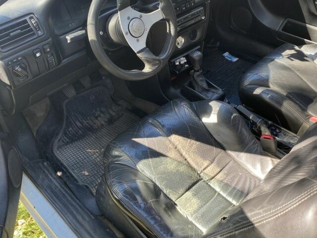 Белый Опель Калибра, объемом двигателя 2 л и пробегом 250 тыс. км за 1500 $, фото 4 на Automoto.ua