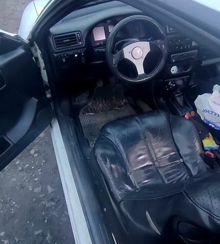 Белый Опель Калибра, объемом двигателя 2 л и пробегом 300 тыс. км за 1400 $, фото 8 на Automoto.ua