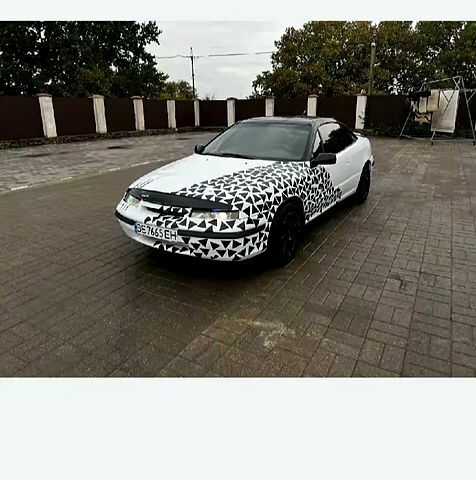 Білий Опель Калібра, об'ємом двигуна 2 л та пробігом 250 тис. км за 1900 $, фото 2 на Automoto.ua